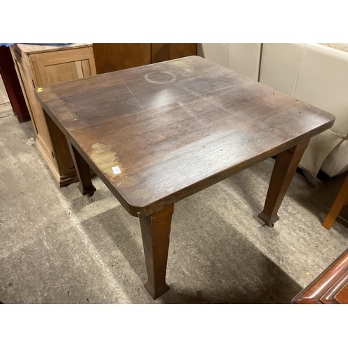 594 - Antique oak wind out dining table with extra leaf