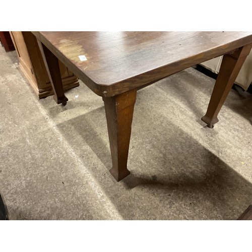 594 - Antique oak wind out dining table with extra leaf