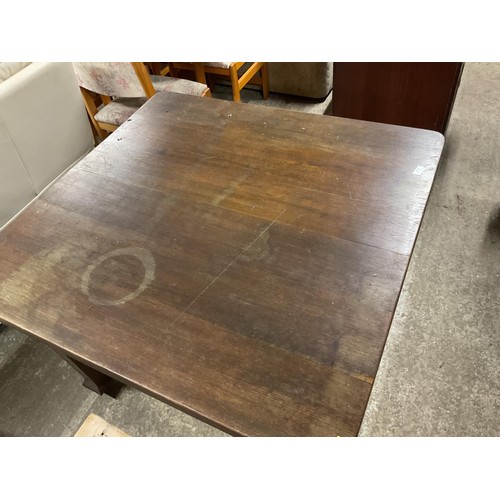 594 - Antique oak wind out dining table with extra leaf