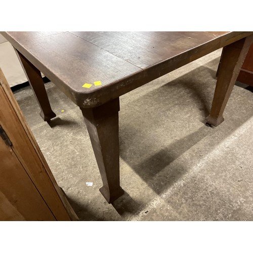 594 - Antique oak wind out dining table with extra leaf