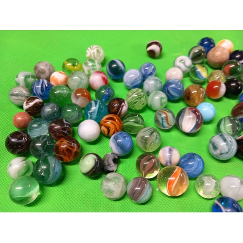 413 - Large qty of antique marbles, incl London bus tin