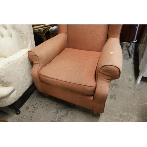 550 - Orange wing back chair