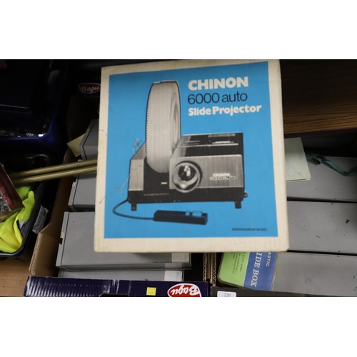 220 - Projector, table, slides - warranted until 12 noon Tuesday following the above sale