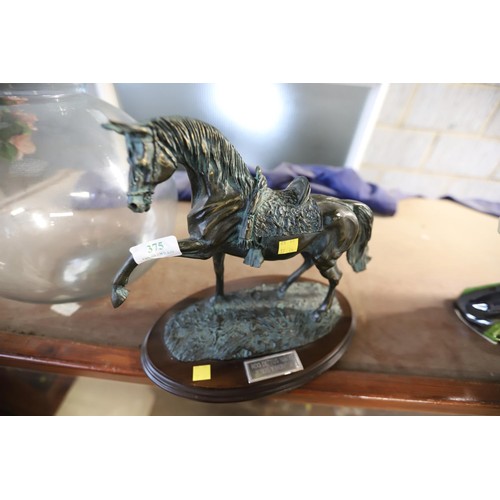 375 - Bronze style horse figurine on wooden base