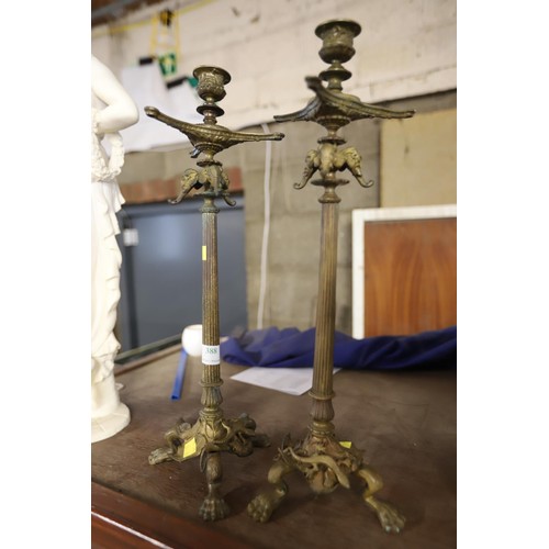 388 - Pair of brass oriental style candlesticks