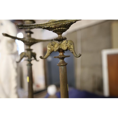 388 - Pair of brass oriental style candlesticks