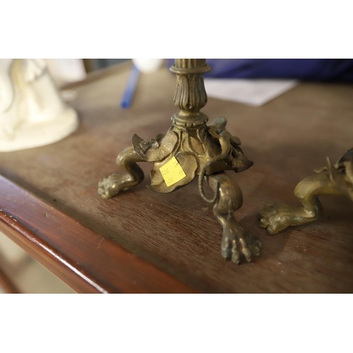 388 - Pair of brass oriental style candlesticks