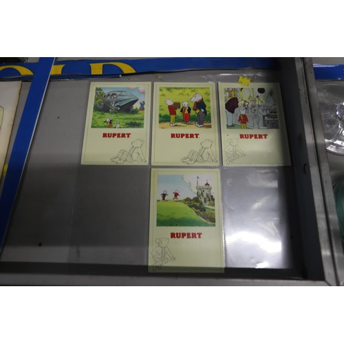 520 - Rupert Bear books, postcards & poster set