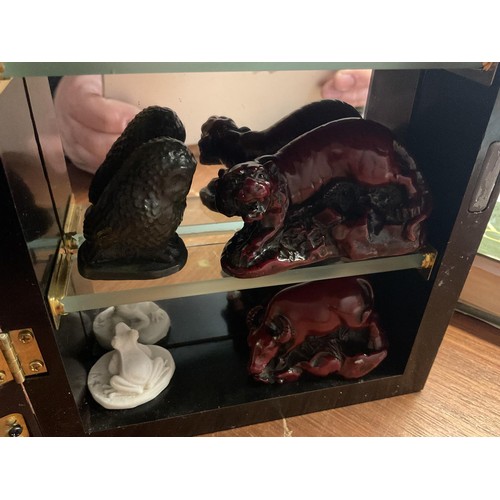 463 - Small display case with onyx, etc small animals