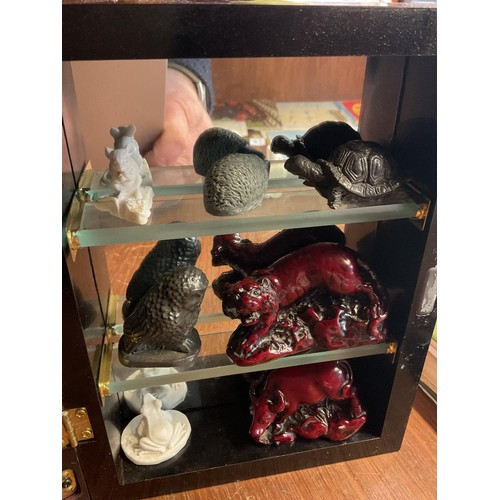 463 - Small display case with onyx, etc small animals