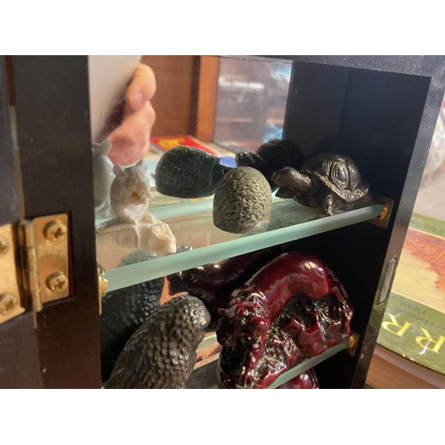 463 - Small display case with onyx, etc small animals