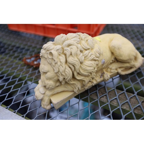 12 - Pair of lion ornaments