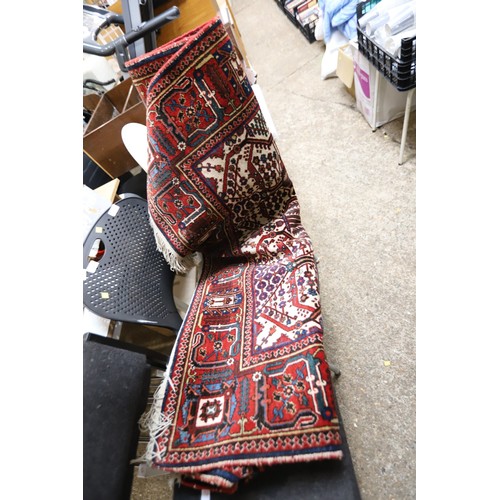 169 - Dark red pattern rug