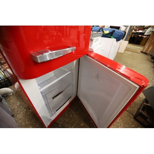 198 - Red SMEG fridge freezer - warranted until 12 noon Tuesday following the above sale