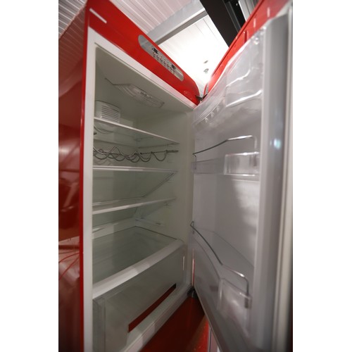 198 - Red SMEG fridge freezer - warranted until 12 noon Tuesday following the above sale