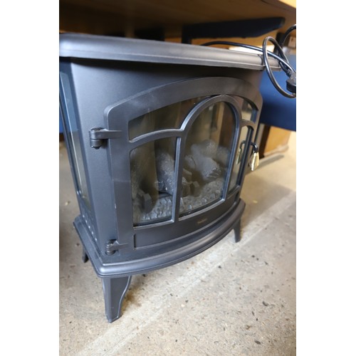 336 - Electric log effect fire/heater with remote - warranted until 12 noon Tuesday following the above sa... 