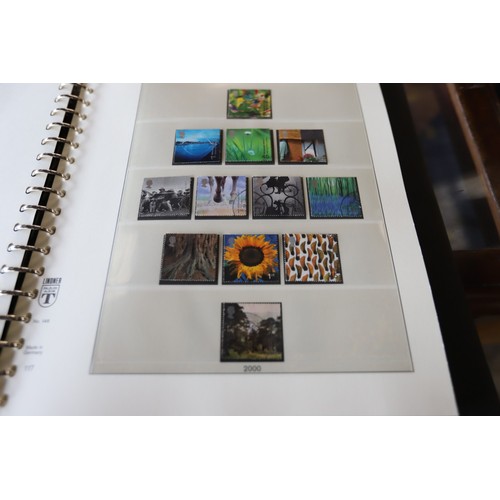 377 - UK stamp album, 2000-2004