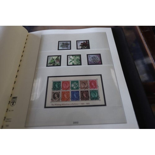 377 - UK stamp album, 2000-2004