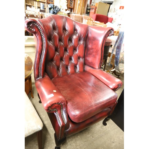 626 - Oxblood Red leather Button back wing armchair with footstool & cushion