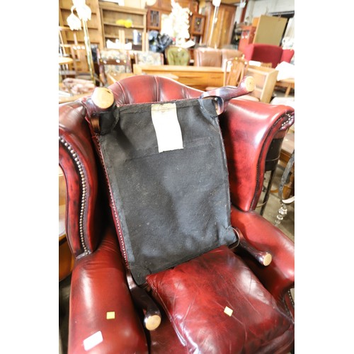 626 - Oxblood Red leather Button back wing armchair with footstool & cushion