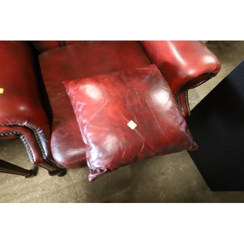 626 - Oxblood Red leather Button back wing armchair with footstool & cushion