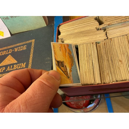 442 - Biscuit tin full of cigarette cards