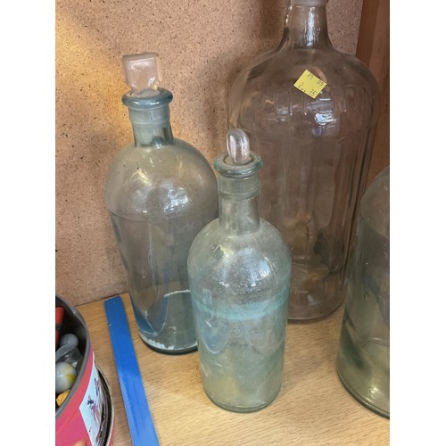 445 - 5 glass bottles, 4 with stoppers