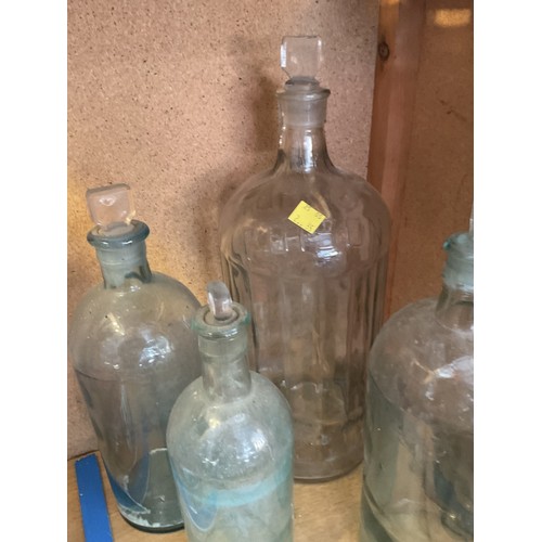 445 - 5 glass bottles, 4 with stoppers