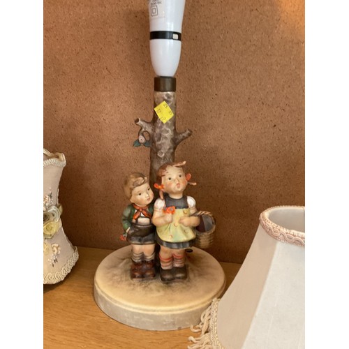 454 - 2 Hummel lamps with shades & Goebel figurine - to be rewired by a qualified electrician