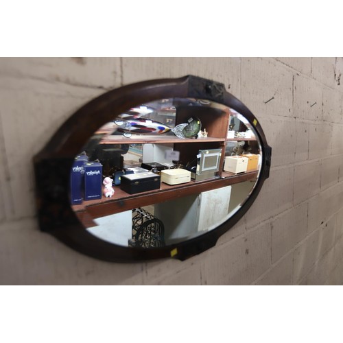 438 - Oval oak frame wall mirror