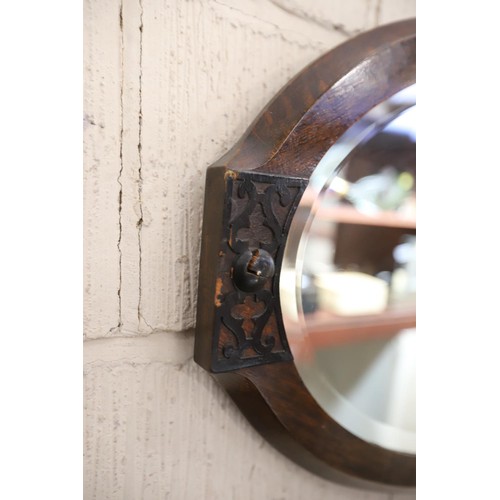 438 - Oval oak frame wall mirror