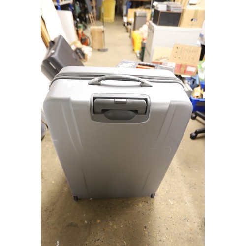55 - 2 large grey suitcases