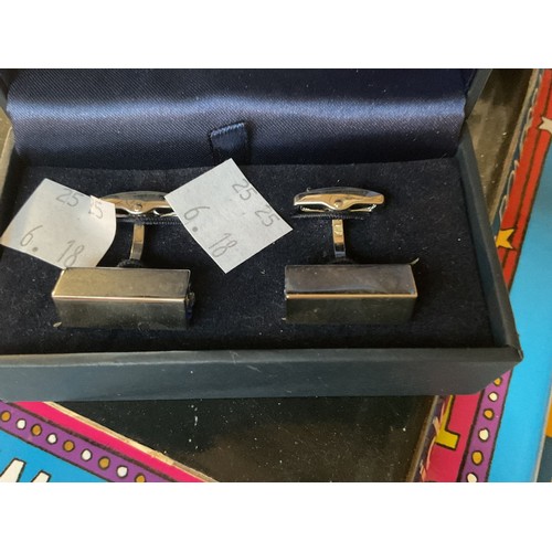 460 - Pair of designer cufflinks