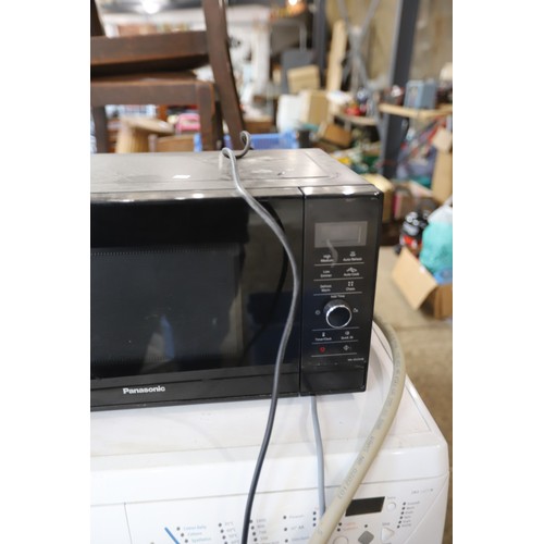 168 - Panasonic microwave - warranted until 12 noon Tuesday following the above sale