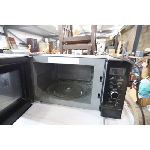 168 - Panasonic microwave - warranted until 12 noon Tuesday following the above sale