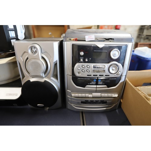227 - Music centre & 2 speakers - warranted until noon Tuesday following the above sale