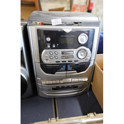 227 - Music centre & 2 speakers - warranted until noon Tuesday following the above sale