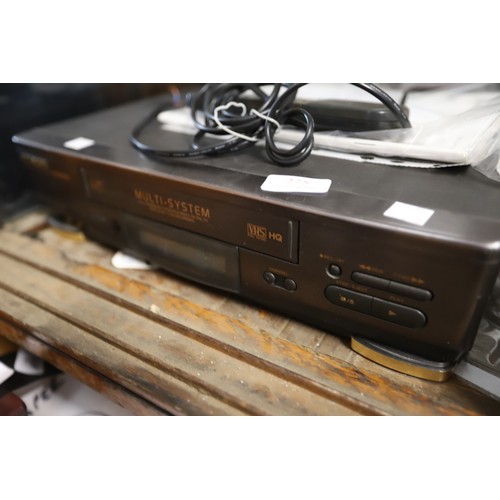 275 - Hitachi video player with remote & instructions - to be rewired by a qualified electrician