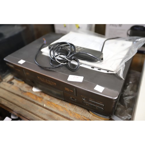 275 - Hitachi video player with remote & instructions - to be rewired by a qualified electrician