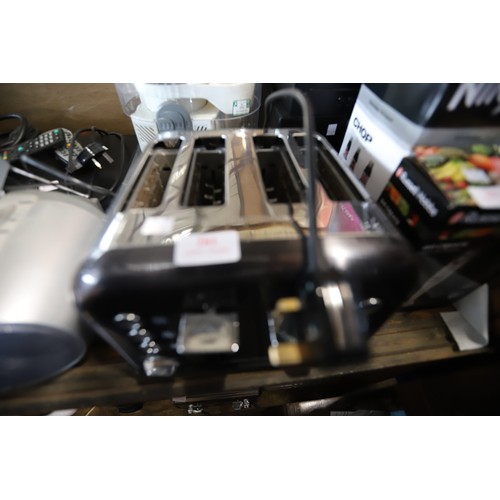 281 - Morphy Richards 4 slice toaster - warranted until 12 noon Tuesday following the above sale