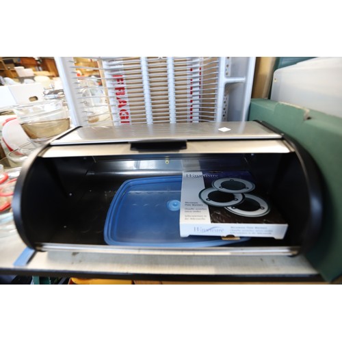 327 - Large qty of kitchenware, incl bread bin, various plastic storage containers, etc