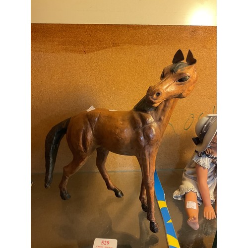 529 - Leather clad horse