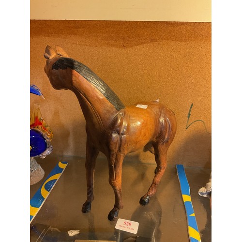 529 - Leather clad horse