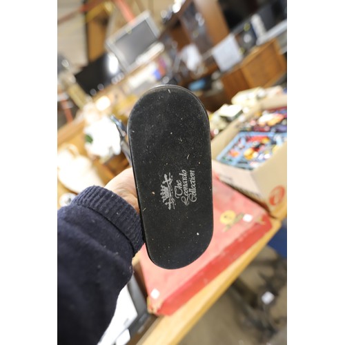 374 - Pair of silver coloured statues