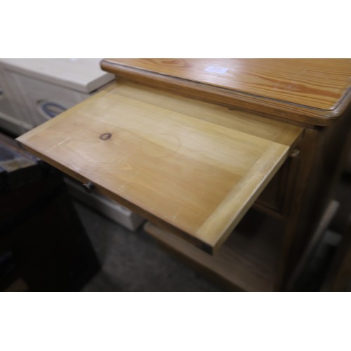615 - Pair of pine bedside cabinets