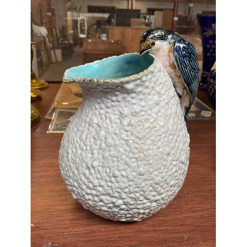 568A - George Jones majolica jug modeled as a swallow or swift building a nest AF (minor break to tail)