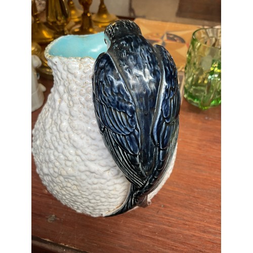 568A - George Jones majolica jug modeled as a swallow or swift building a nest AF (minor break to tail)