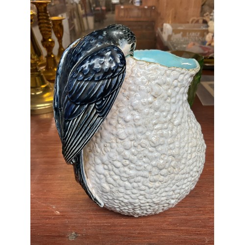 568A - George Jones majolica jug modeled as a swallow or swift building a nest AF (minor break to tail)