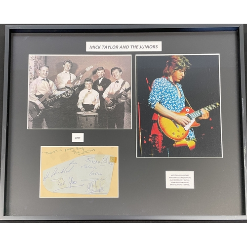 12 - ROLLING STONES INTEREST - MICK TAYLOR AND THE JUNIORS SIGNED PAGE. COA A mounted, framed and glazed ... 