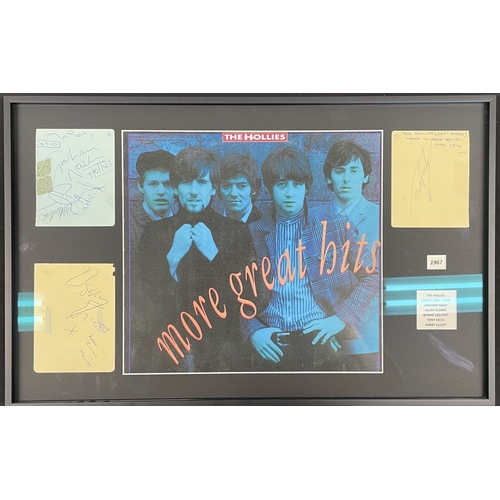 19 - THE HOLLIES - SET OF SIGNATURES. THE HOLLIES - SET OF SIGNATURES. A mounted, framed and glazed displ... 